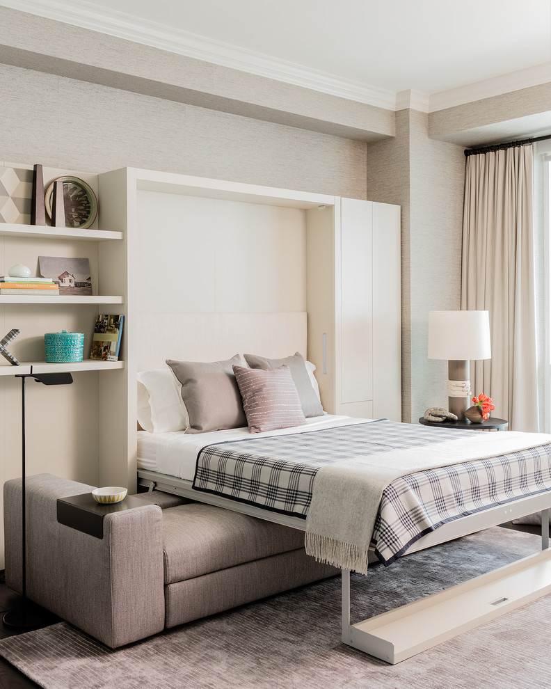 Свежая идея для дизайна: изолированная гостиная комната среднего размера в современном стиле с бежевыми стенами, ковровым покрытием и телевизором на стене - отличное фото интерьера