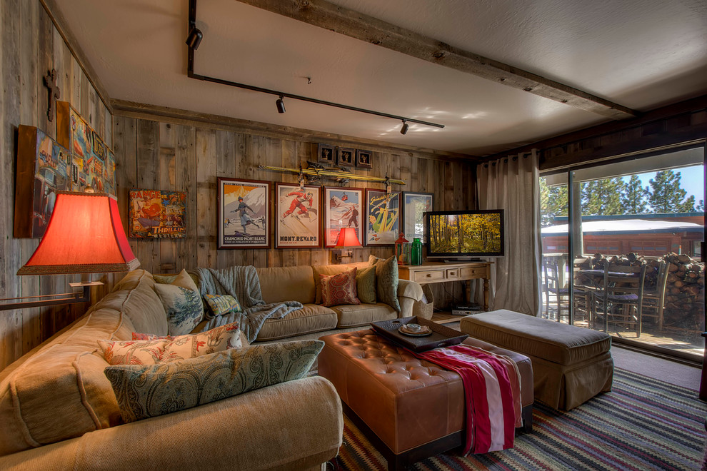 Rustic games room in Sacramento with a freestanding tv.