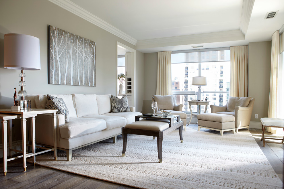 Inspiration for a mid-sized transitional open concept light wood floor family room remodel in Toronto with gray walls