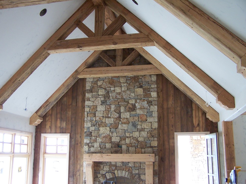 Vaulted ceiling with fireplace mantel Farmhouse Family Room
