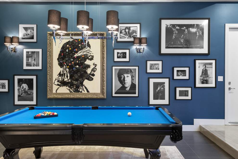 Medium sized contemporary open plan games room in Las Vegas with blue walls, ceramic flooring, no fireplace and grey floors.