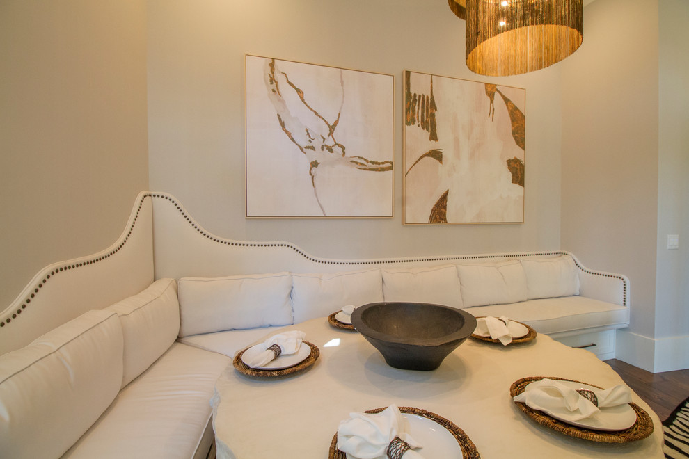 Dining room - coastal dark wood floor dining room idea in Miami with white walls