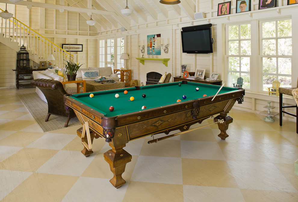 Photo of a rural games room in San Francisco with painted wood flooring and yellow floors.