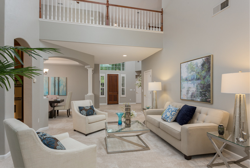 Example of a large transitional loft-style carpeted family room design in Sacramento with gray walls