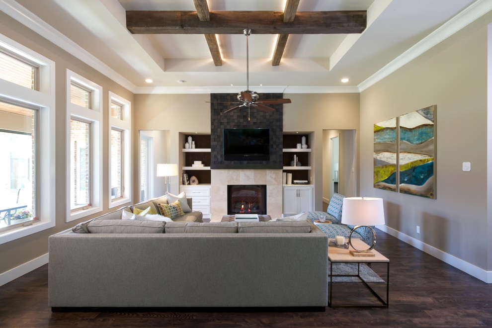 Family room - large transitional open concept dark wood floor family room idea in Dallas with beige walls, a standard fireplace, a tile fireplace and a wall-mounted tv