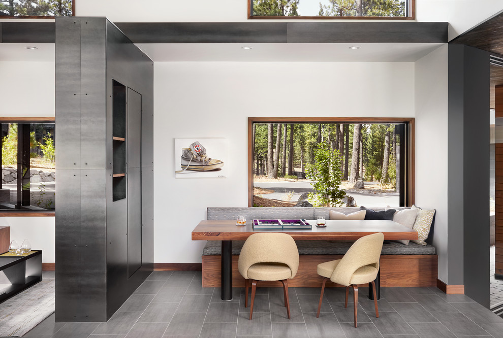 Inspiration for a medium sized contemporary open plan games room in San Francisco with a game room, white walls, porcelain flooring, grey floors and no fireplace.