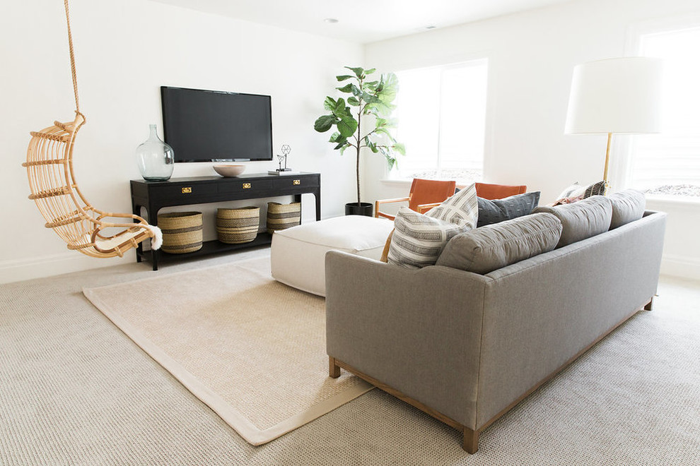 Inspiration for a mid-sized transitional open concept carpeted family room remodel in Salt Lake City with white walls and a wall-mounted tv