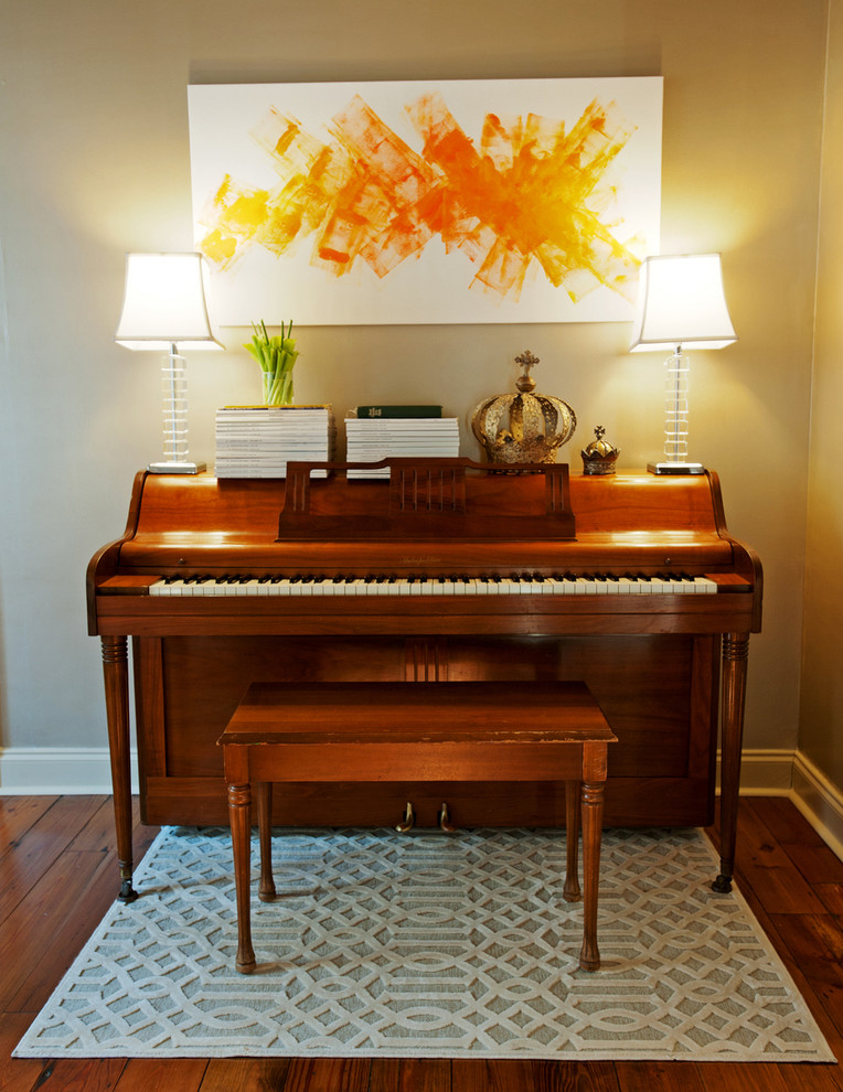 Example of a transitional family room design in New Orleans