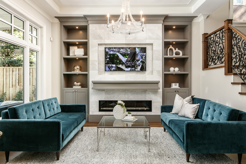 Classic games room in Vancouver with a ribbon fireplace and a built-in media unit.
