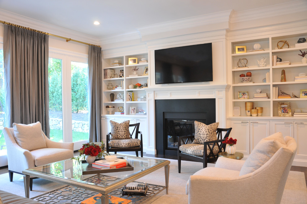 Inspiration for a large transitional open concept dark wood floor and brown floor family room library remodel in Boston with white walls, a standard fireplace, a stone fireplace and a wall-mounted tv