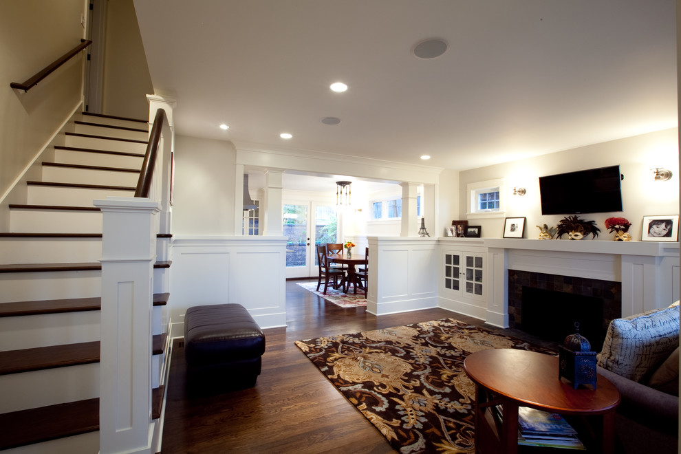 Example of a transitional family room design in Seattle