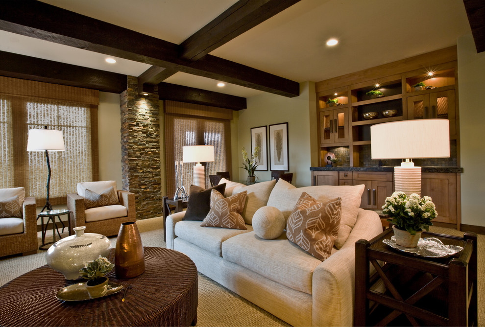 Mid-sized mountain style enclosed carpeted family room photo in Salt Lake City with beige walls, a standard fireplace, a stone fireplace and a wall-mounted tv