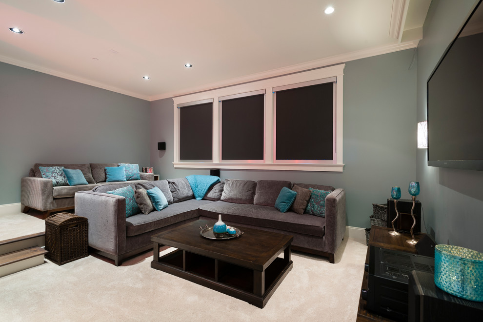 Example of a large transitional enclosed carpeted family room design in Vancouver with blue walls, no fireplace and a wall-mounted tv