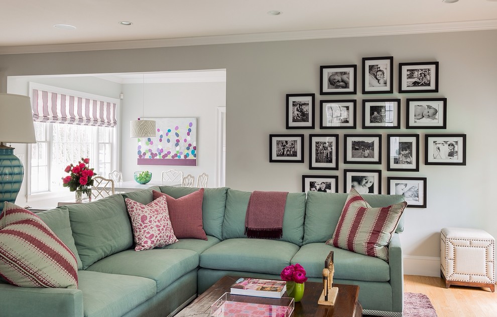 Example of a transitional family room design in Boston