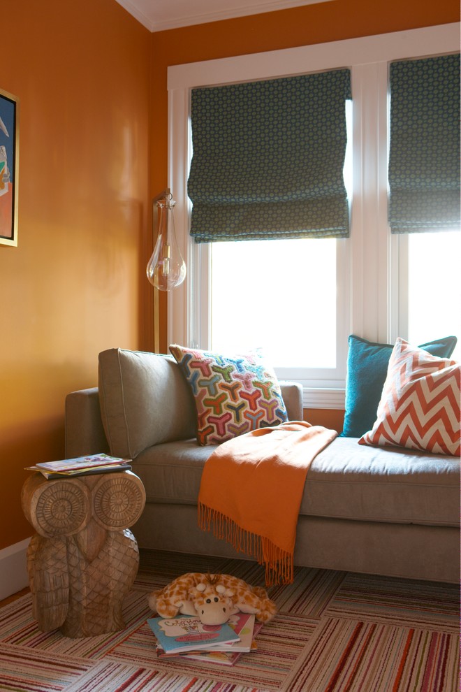 Inspiration for a small traditional enclosed games room in Boston with orange walls, carpet, no fireplace and no tv.