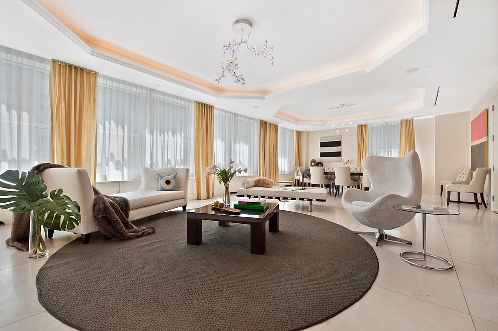 Contemporary open plan games room in New York with beige walls.