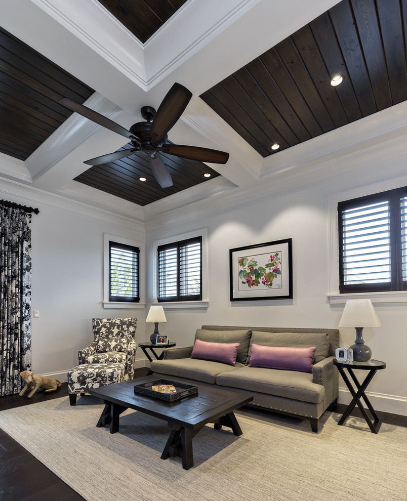 This is an example of a mediterranean games room in Miami with feature lighting.