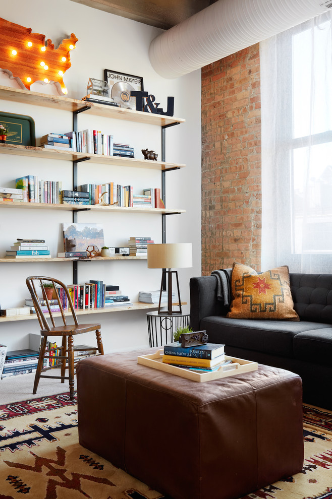 Family room library - contemporary family room library idea in Chicago with white walls