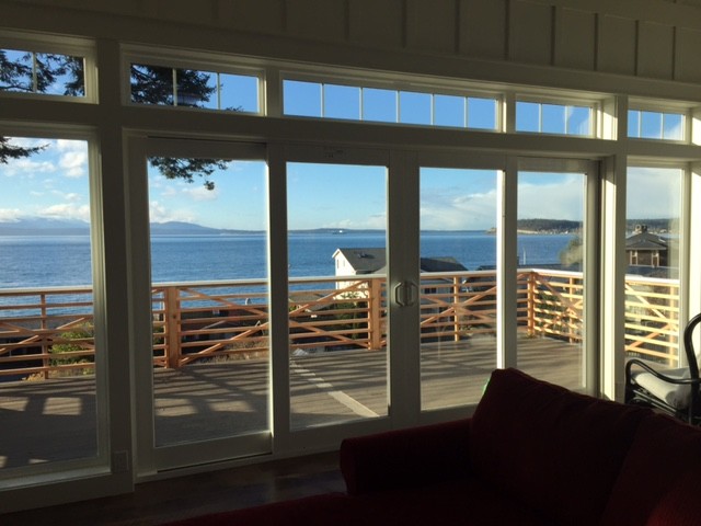 Photo of a medium sized beach style open plan games room in Seattle with white walls and no fireplace.
