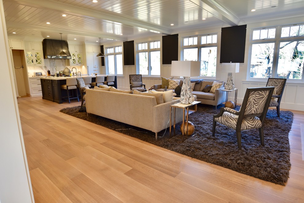 Photo of a large contemporary open plan games room in DC Metro with white walls, light hardwood flooring and beige floors.