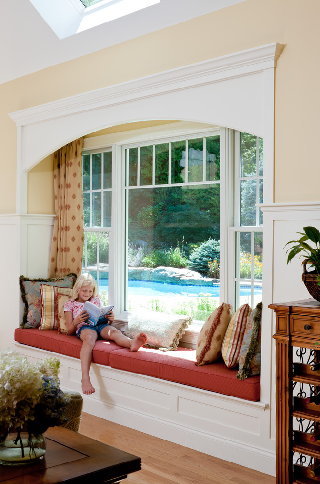 Example of a classic family room design in Boston