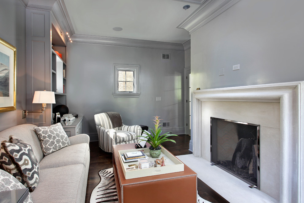 Classic games room in Chicago with grey walls and dark hardwood flooring.