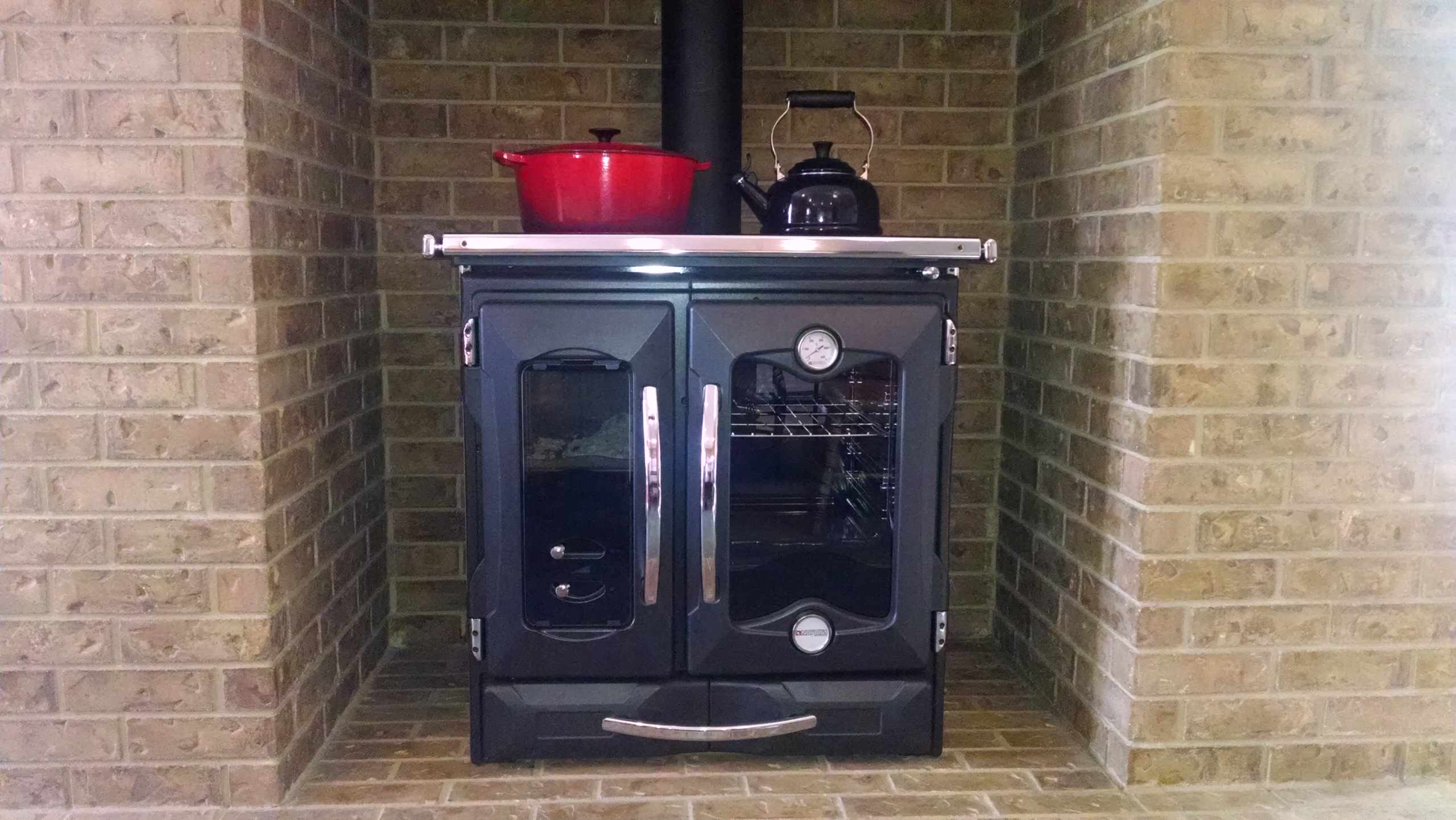 Wood Burning Cooking Stove by La Nordica, Wood Fired Cooking & Baking -  Rustic - Family Room - New York - by Grills'n Ovens LLC | Houzz