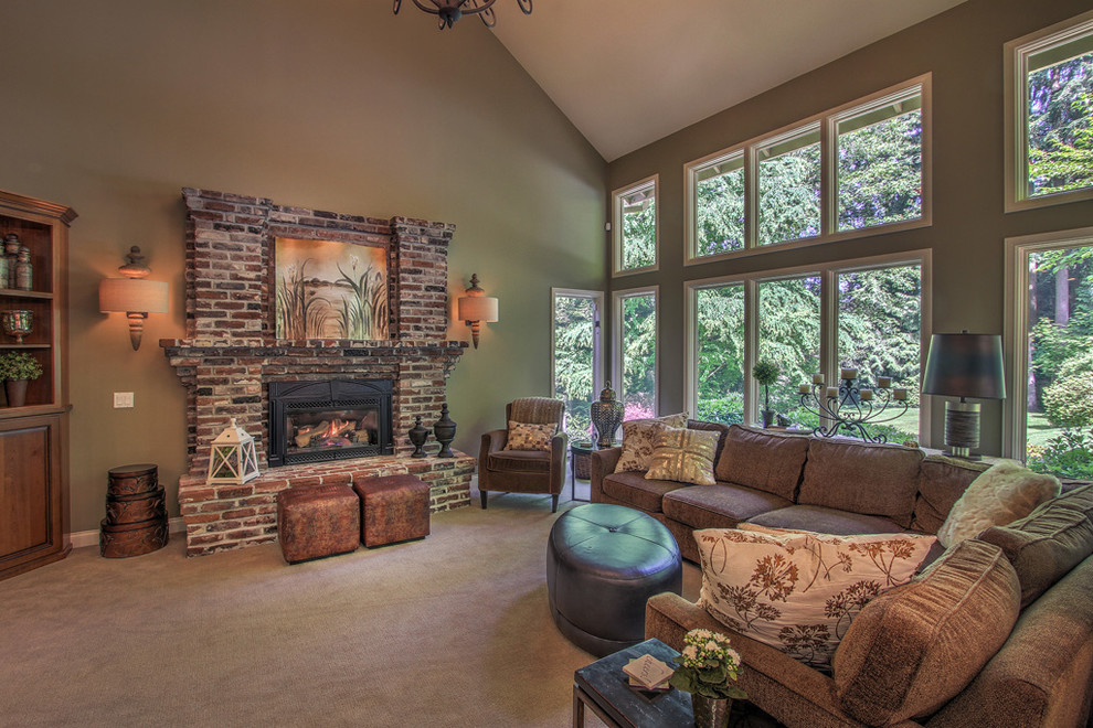 Family room - large transitional open concept carpeted family room idea in Seattle with green walls, a standard fireplace, a brick fireplace and a media wall