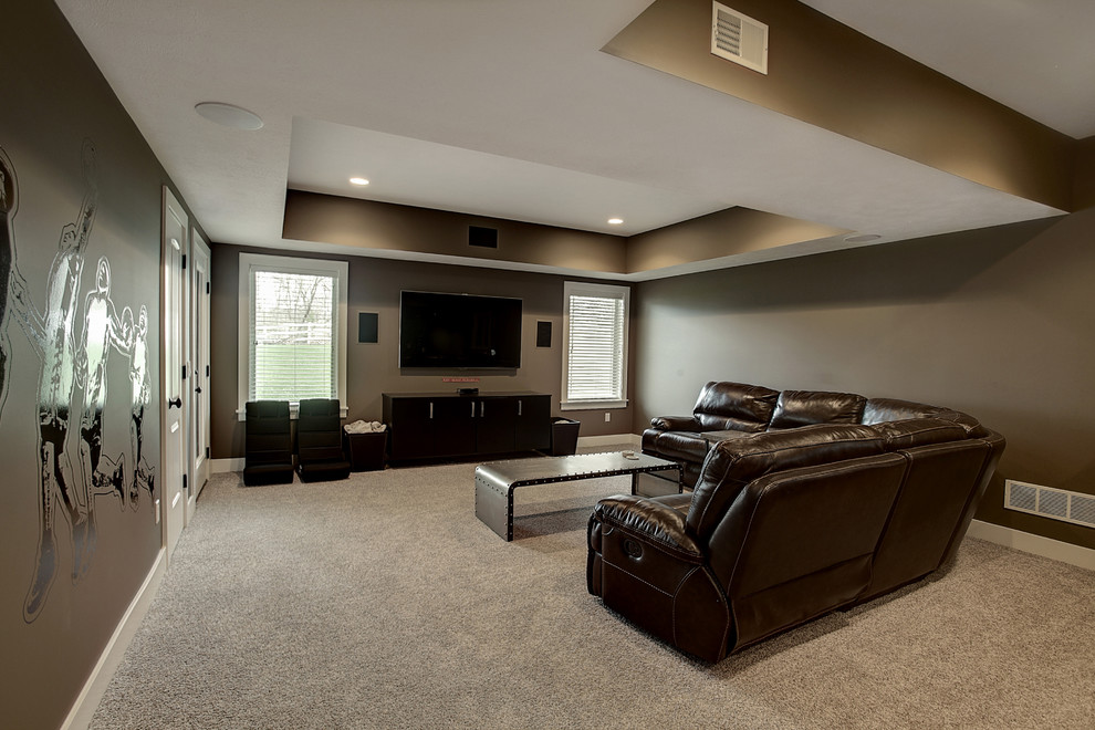 Photo of a traditional enclosed games room in Grand Rapids with a game room and a wall mounted tv.