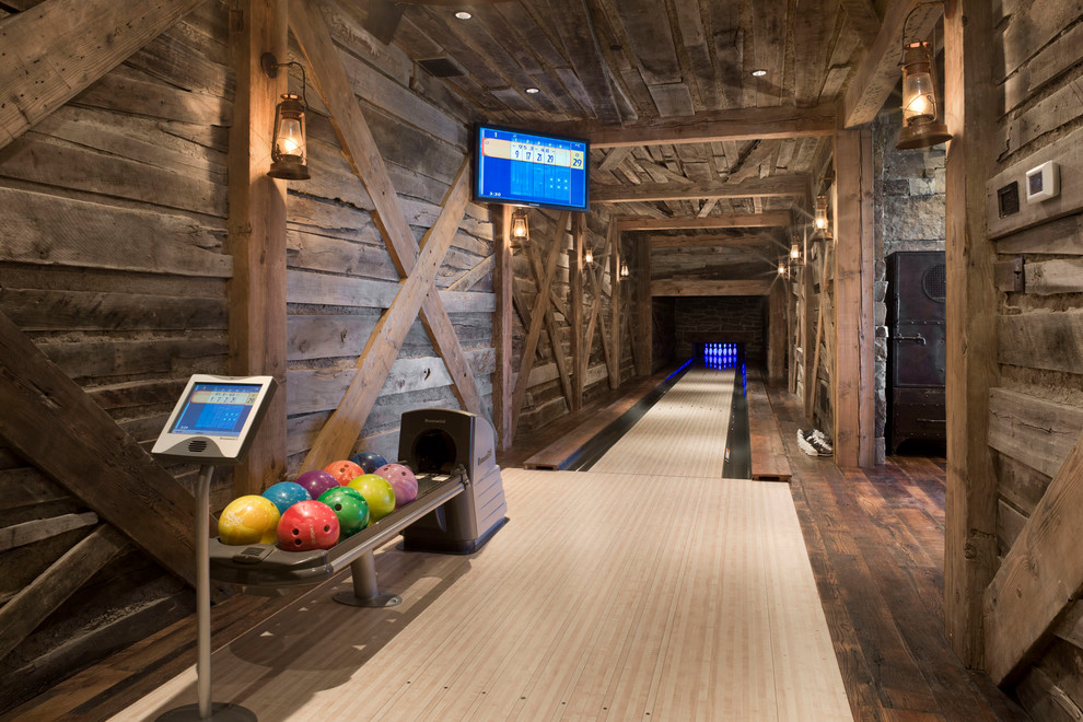 Game room - rustic game room idea in Other