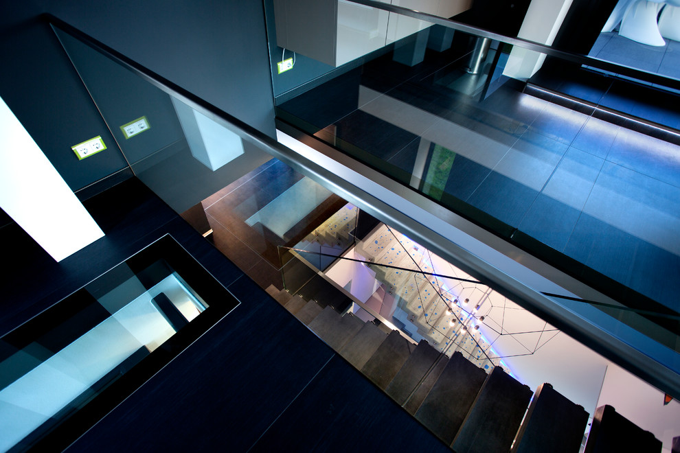 Photo of a medium sized contemporary staircase in Cologne.