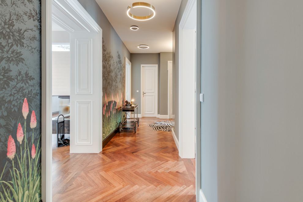 Hallway - contemporary medium tone wood floor and wallpaper hallway idea in Munich