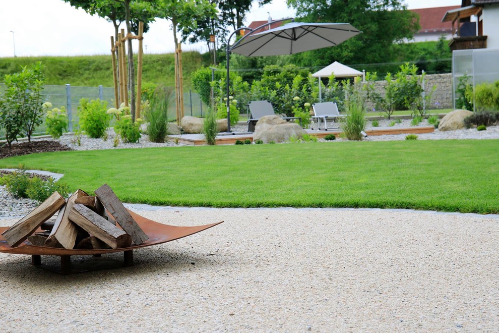 Gartenumgestaltung mit Naturstein und viel Raum Garden Munich by