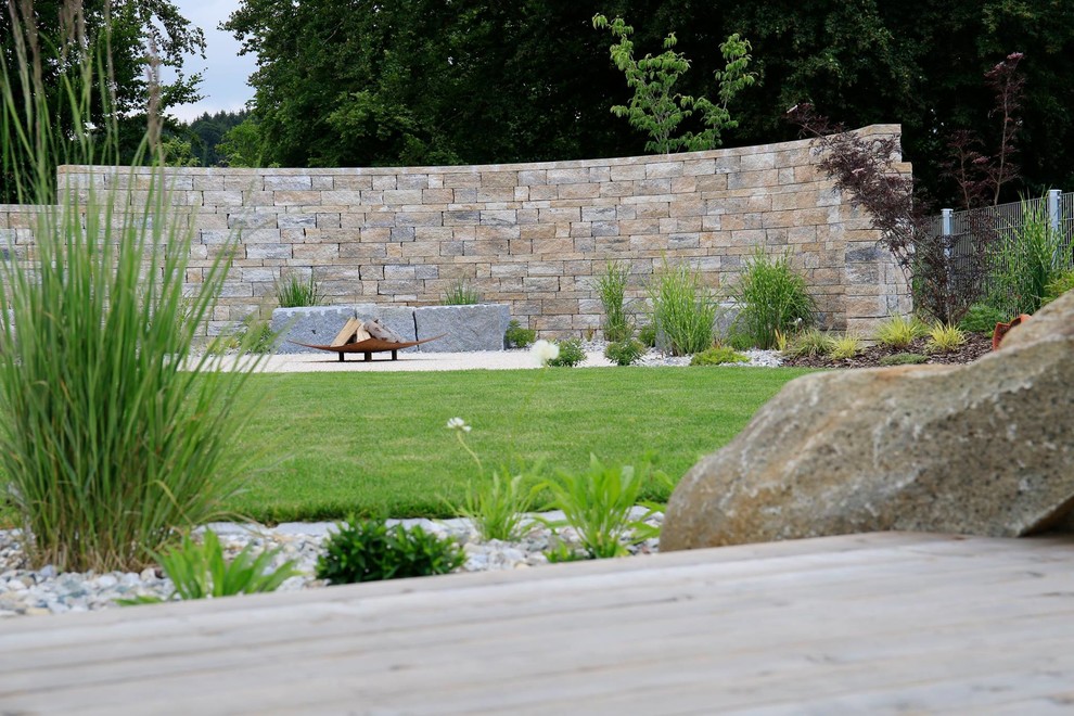 Gartenumgestaltung mit Naturstein und viel Raum Garden Munich by