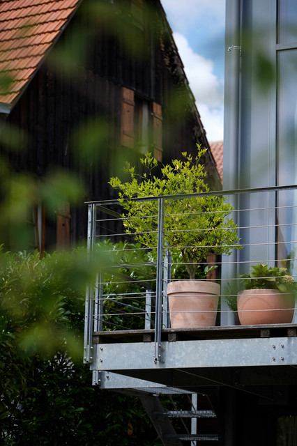 Moderne und offene Gartenanlage für ein Architektenhaus Modern