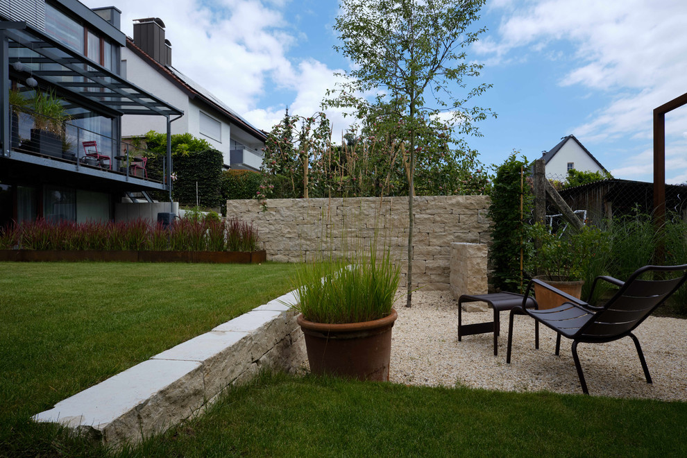 Moderne und offene Gartenanlage für ein Architektenhaus Contemporary