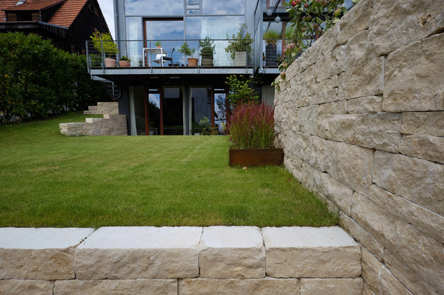 Moderne und offene Gartenanlage für ein Architektenhaus Modern
