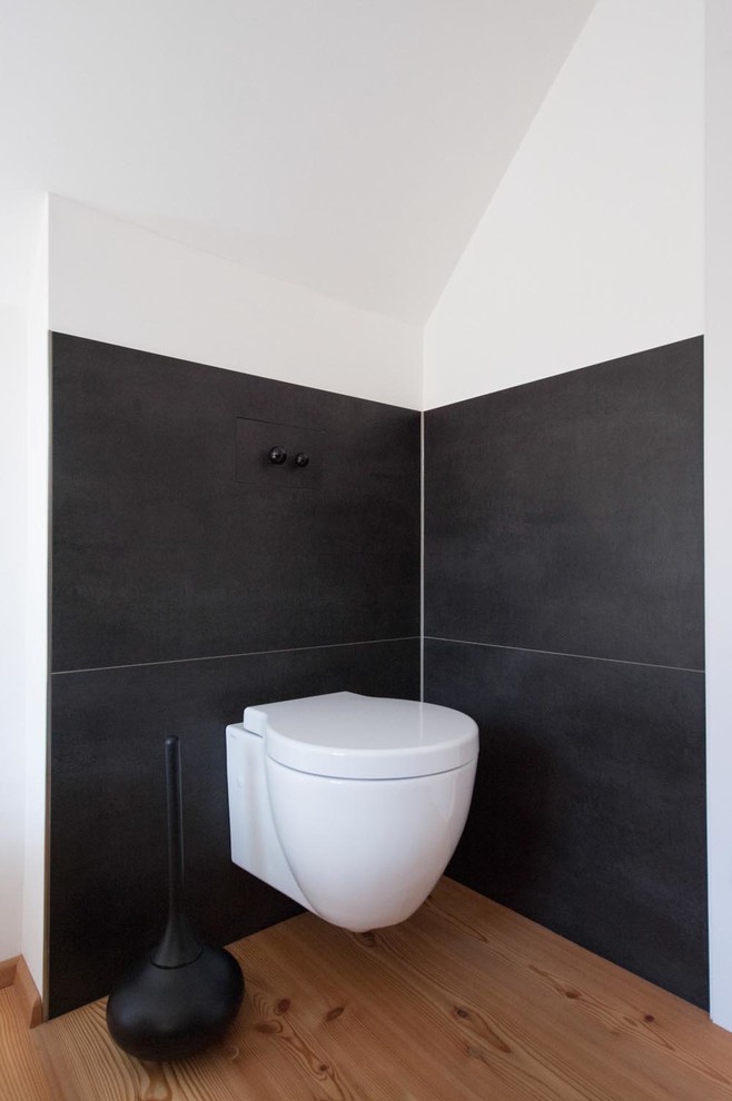 Inspiration for a modern powder room remodel in Munich