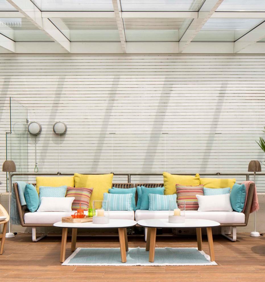 Inspiration for a medium sized beach style conservatory in Bilbao with ceramic flooring, no fireplace, a glass ceiling and brown floors.