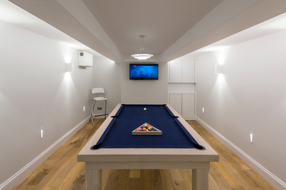This is an example of a contemporary games room in Hertfordshire.