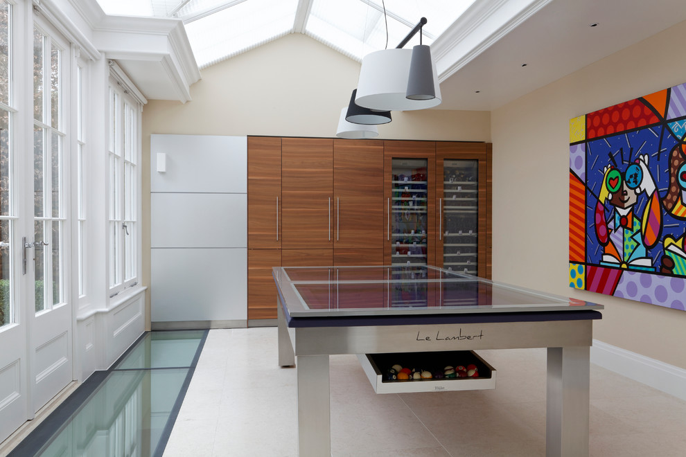 Photo of a contemporary enclosed games room in London with beige walls and beige floors.