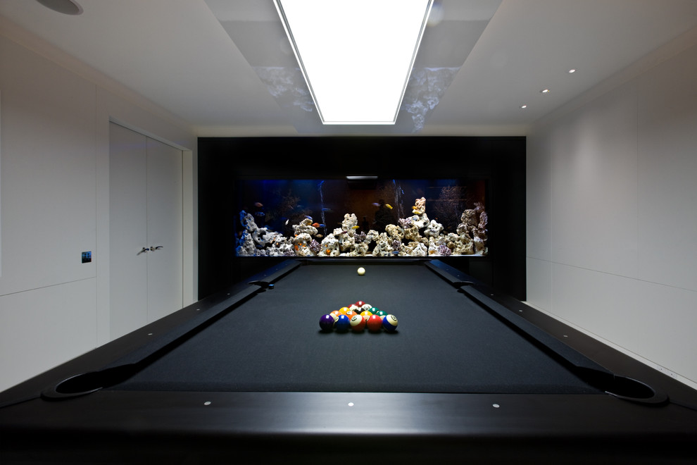 Inspiration for a contemporary games room in London with multi-coloured walls.