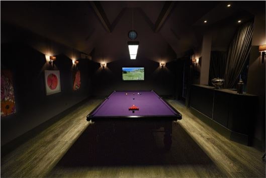 Modern games room in West Midlands.