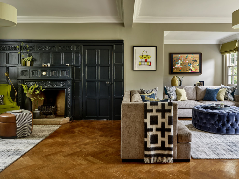 Photo of a large midcentury open plan games room in Other with a reading nook, dark hardwood flooring and beige walls.