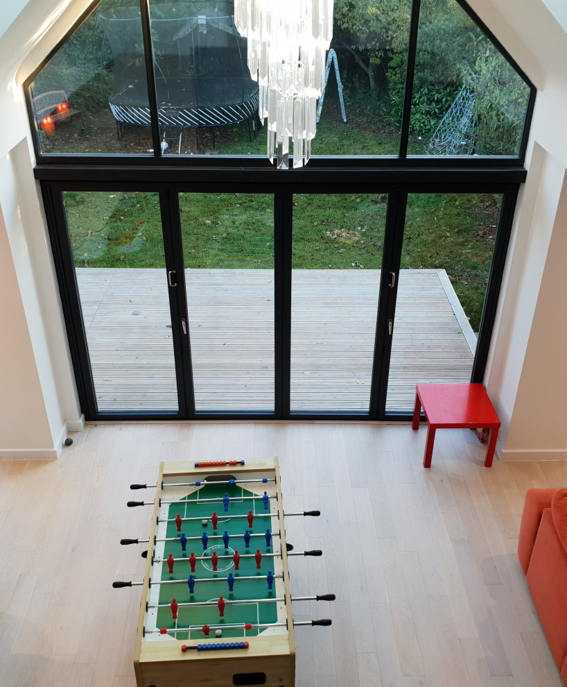 This is an example of a contemporary games room in Cheshire.