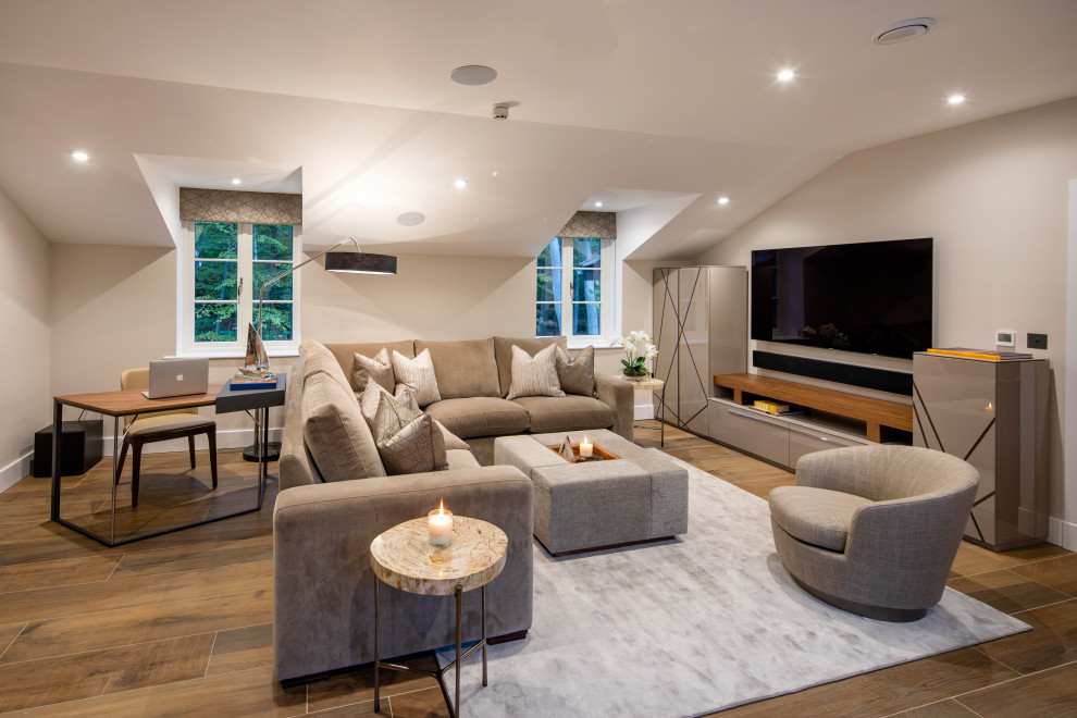 Photo of a large contemporary enclosed games room in Buckinghamshire with beige walls, dark hardwood flooring, no tv, brown floors and no fireplace.