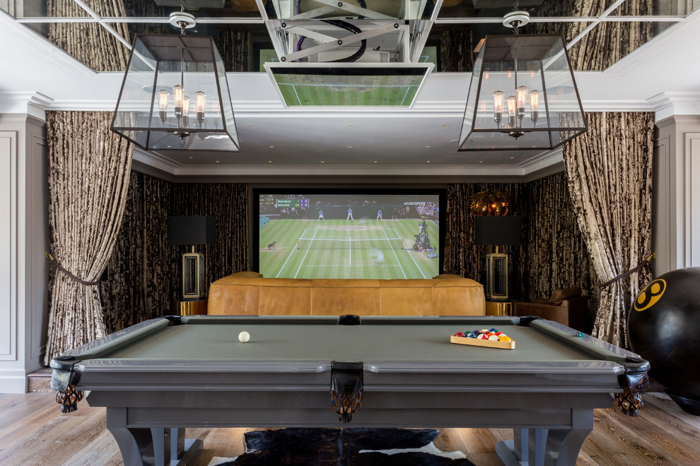 Design ideas for a large rural enclosed games room in West Midlands with a game room, brown walls, dark hardwood flooring, a standard fireplace, a concrete fireplace surround, a built-in media unit and brown floors.