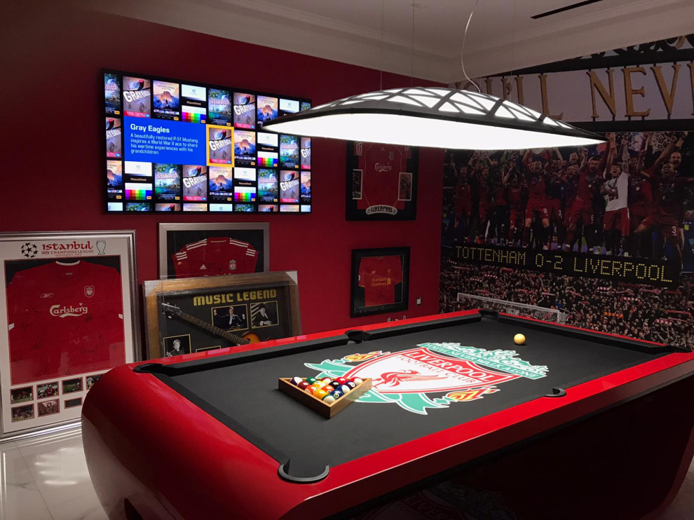 This is an example of a large world-inspired games room in Hertfordshire.