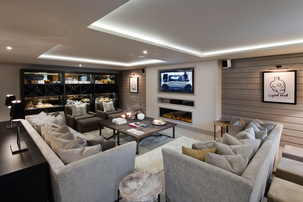 Design ideas for a large contemporary enclosed games room in Other with a game room, beige walls, carpet, a ribbon fireplace, a plastered fireplace surround and a built-in media unit.