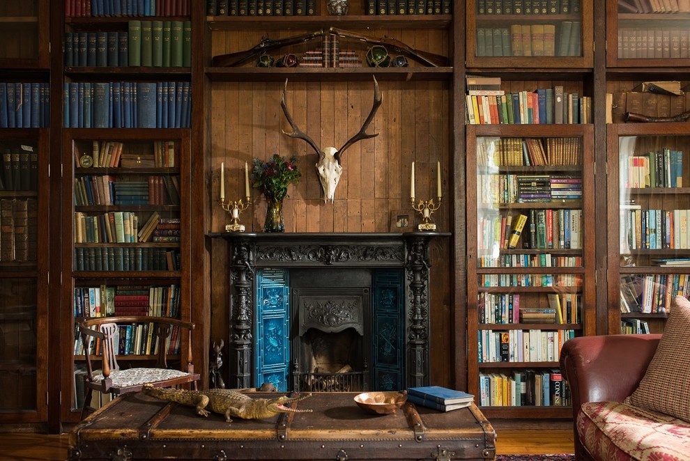 Modelo de sala de estar con biblioteca rural con todas las chimeneas